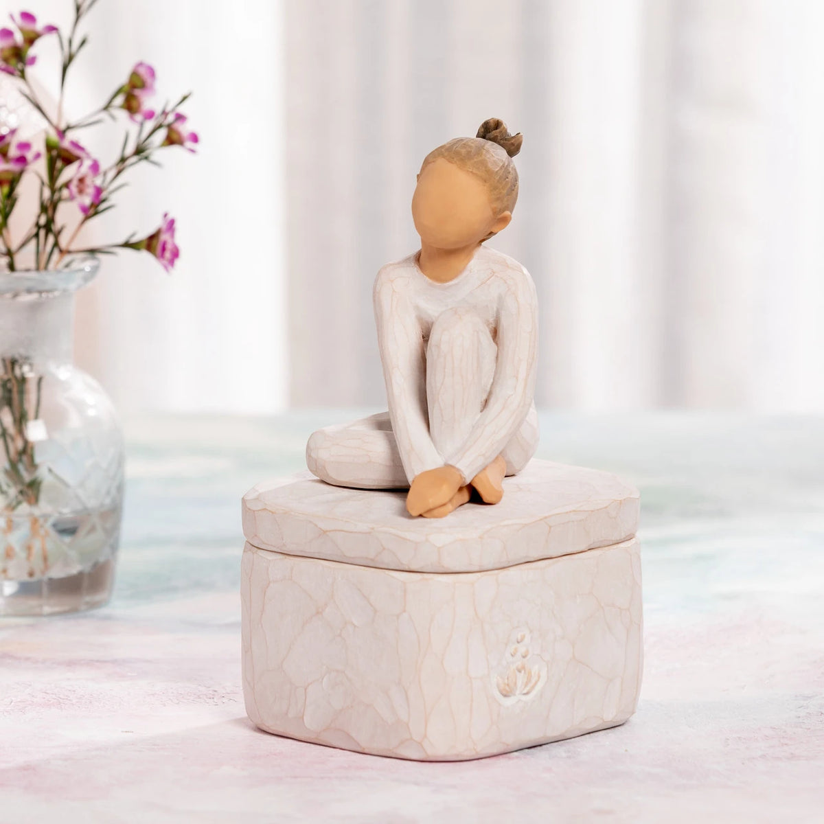 Willow Tree The Dancer Keepsake Box, 3.0"w x 3.25”d hand-painted resin box with 2.25”h figure of seated dancer in cream leotard affixed to lid