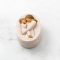 Willow Tree Tenderness Keepsake Box, 3.4" oval x 2.4" W x 1.5" D hand-painted resin box with removable lid. Lid has bas-relief carving of woman holding toddler, touching foreheads, inside of box has sentiment