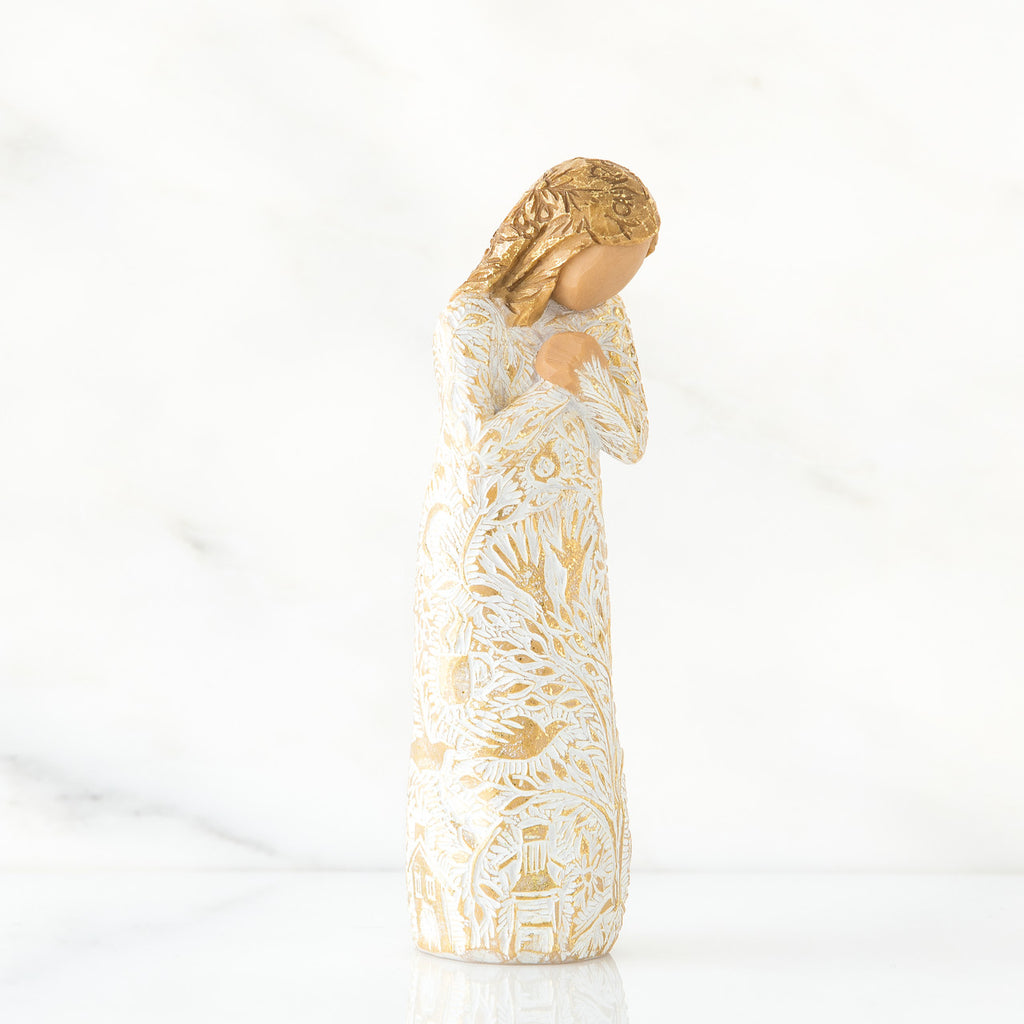 Gold hair girl figurine in white/gold dress - close view - all white background